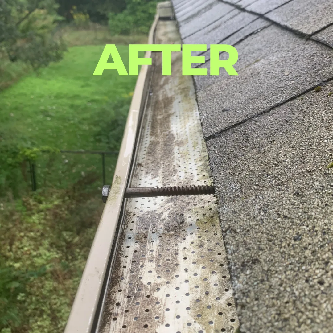 After — Cleared by hand and flushed — this is what your eavestroughs look like after leaf-fall.